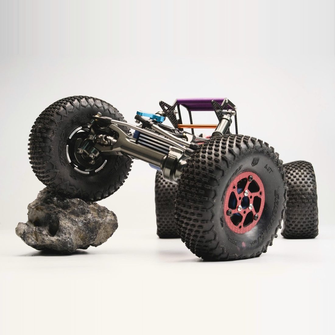 Monty loading a wheel against rock