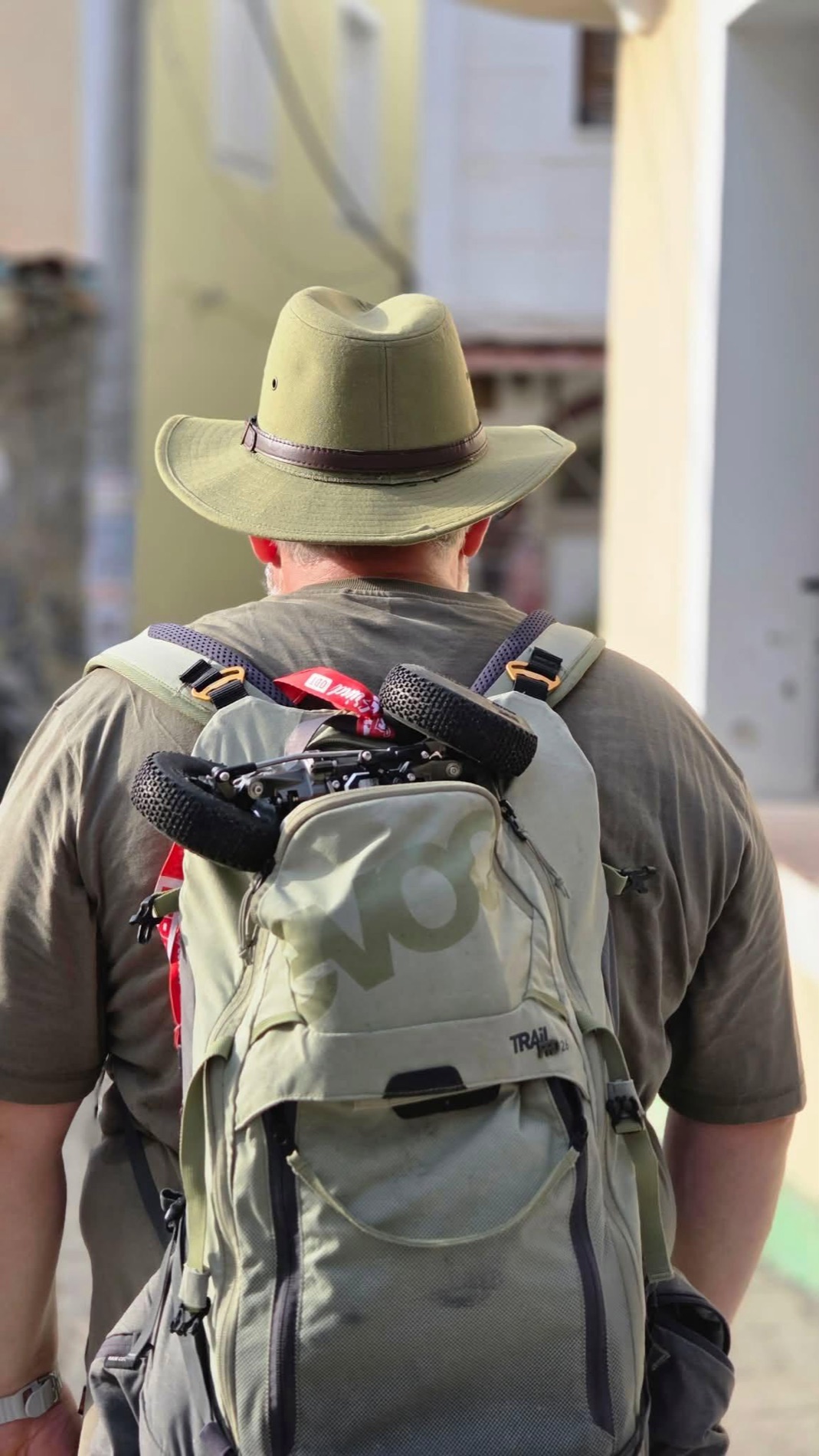 A 9C crawler strapped to a hiking backpack on the walk in